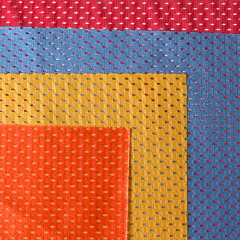 USFMA-Fabric 4 swatches of different colored fabric atop each other